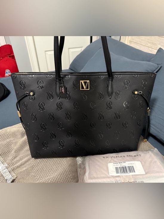 Victoria's Secret Handbags - Victoria's Secret Black Embossed Logo Tote with Gold Accents